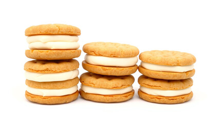 Stacks of vanilla cream-filled cookies on a white background