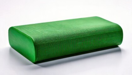 Green rectangular object with rounded edges on a white background, studio shot.