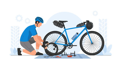 Fototapeta premium Cyclist Repairs A Bike Tire While On Tour For an Active Lifestyle