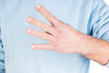 male hand holding something