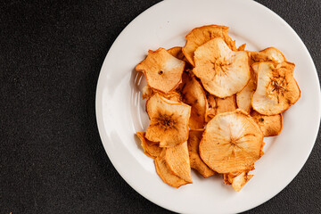 Apple chips dried apple sweet slices natural healthy food main course ingredient appetizer fresh tasty table setting gourmet food background rustic food top view copy space keto and paleo diet 