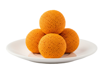 bright orange laddu balls on white plate
