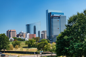 Modern American city view of Richmond Virginia with park and downtown buildings