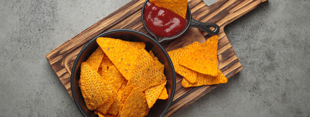 Nachos tortilla chips salsa dip wooden board Mexican Tex-Mex snack fast food