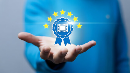 Award-winning film badge with stars and ribbon, held in a hand