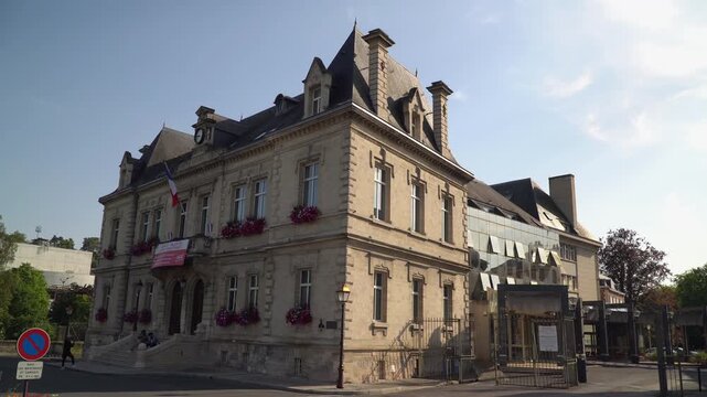 The City hall of Creil, nestled on the the Francois Mitterrand square, Oise department, France.	
