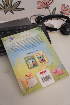 Children's book cover with illustrations of animals and text in Polish language