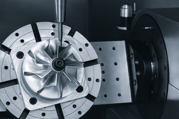 CNC modern milling machine produces a metal turbine,  industrial concept background © Aleksandr Matveev