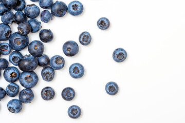 Ripe blueberries on a white background. Top view