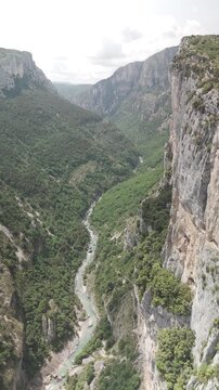 Top view of clear green river in natural canyon landscape
