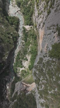 Top view of clear green river in natural canyon landscape

