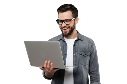 Happy young bearded man in glasses smiling while looking at a laptop computer, isolated on transparent background - Powered by Adobe