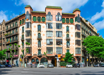 Street with beautiful buildings in Barcelona, Catalonia, Spain. Architecture and landmark of Barcelona. Cozy cityscape of Barcelona