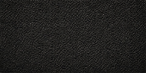 Fototapeta premium A dark macro shot of a natural black leather texture background featuring a luxury textured skin pattern and rough material surface for a high-quality textile design wallpaper