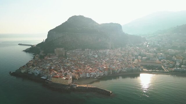 Cefal&ugrave;, Sicily, aerial drone video. Cefal&ugrave; beach, cathedral and medieaval Town. High quality 4k footage 