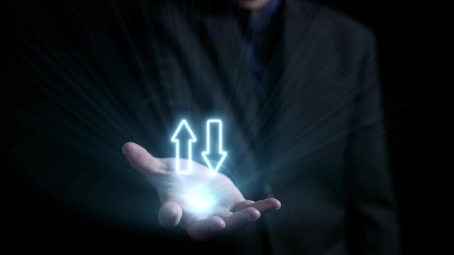 A businessman presents glowing arrows that symbolize the relationship between quality and cost. The visual representation highlights key concepts in economic growth and strategy. Qubit
