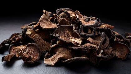 A Dark Textured Mound Of Dried Curly Mushroom Pieces