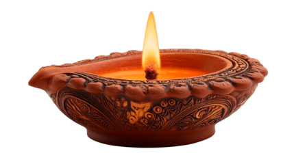 Traditional clay Diya lamp with a burning wick used in festivals and ceremonies across various cultures