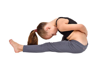 Girl in yoga pose wearing leggings and black crop top, concept of fitness.