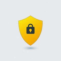 A yellow shield with a black lock on a gray background representing security and protection