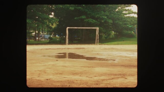 Rustic soccer scene with autumnal reflections, Vintage style photograph capturing peaceful summer sports moment