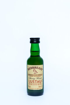 Miniature bottle of Redbreast Lustau Edition Single Pot Still Irish Whiskey. Premium sherry finish whiskey from Midleton Distillery, isolated on white background. Ukraine, Zhytomyr, January 03, 2026