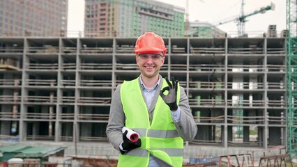 Pleased construction auditor is showing approval of building works