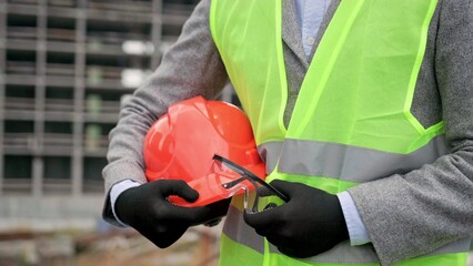 Project manager leaving building site after inspection
