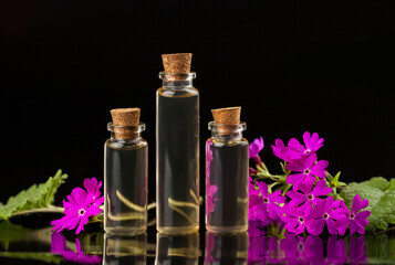 primrose essential oil in  beautiful bottle on table