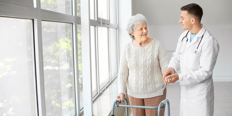 Senior woman with doctor in hospital