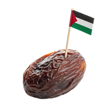 A stuffed date with a flag toothpick, symbolizing a unique culinary delight