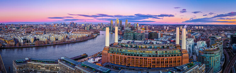 Aerial twilight panorama of Battersea Power Station redevelopment, London UK