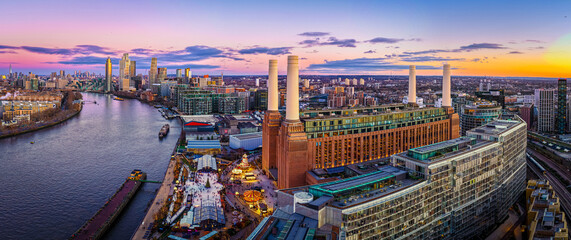 Naklejka premium Christmas at Battersea Power Station panorama on River Thames, London UK