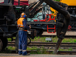 Special train for maintenance of the railway. Vacuum cleaning of railroad