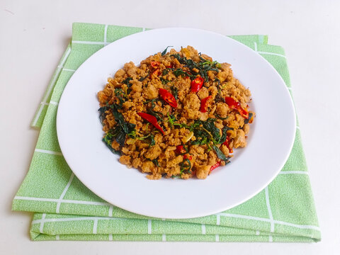 Tumis Oncom Kemangi. A popular Sundanese vegetarian dish of saut&eacute;ed oncom and basil leaves. Traditional homemade food concept