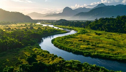 Aerial View of Serene River Flowing Through Lush Green Valley Under Morning Sunlight
