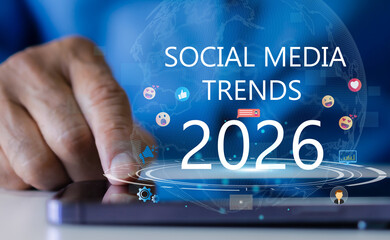 Hand touching smartphone with social media trends 2026 interface, digital marketing strategy concept, future communication, global network, online technology, viral content planning and engagement