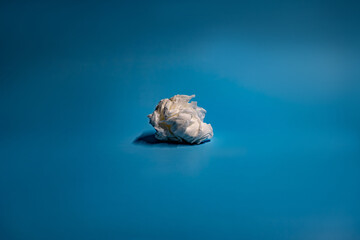 Fototapeta premium used tissue looks like a cloud in a blue background
