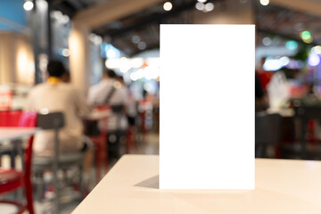 Blank Table Tent Card Mockup in Food Court Restaurant with Bokeh Background