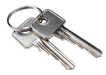 Two metal keys on a ring, angled on black. Access and entry implied