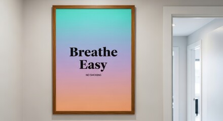 Framed Poster Displaying the Message Breathe Easy with No Smoking Notice on a Wall