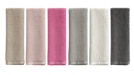 Six stacked towels in soft hues, neatly folded and subtly textured, presented side-by-side