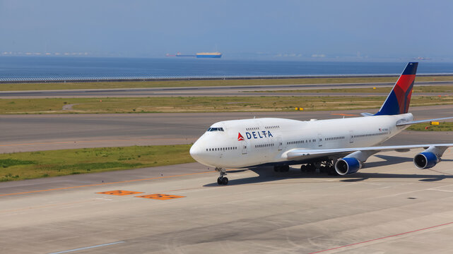 Large Delta airlines flight Boeing 747-451 at Chubu Centrair International Airport in Nagoya, Japan.
