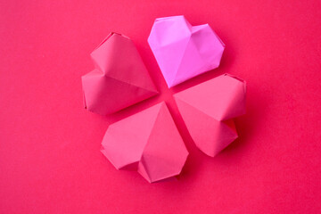 Heart shape paper decoration isolated on pink background with copy space for greeting text, Valentines day and love romance concept background