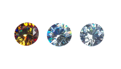 Three round, faceted gems of varying colors against a black backdrop