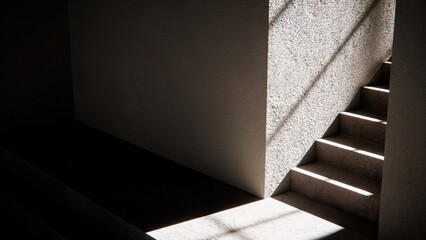3D render of stair base with dramatic sunlight and shadows. Ideal for architectural visualization, interior design, and minimalist concept mockups with strong geometric contrast.