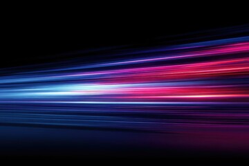 Dynamic streaks of light in vibrant hues against a stark, black backdrop, creating movement