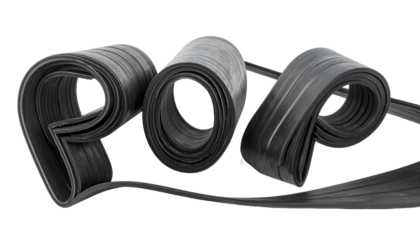 Curving, black rubber strips forming "POP" against a black backdrop