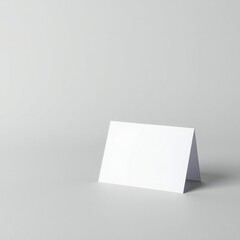 Blank folded card on a light gray background