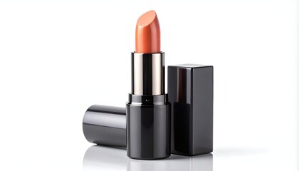 Coral lipstick upright with open lid, and a second lid laying to the left on white background